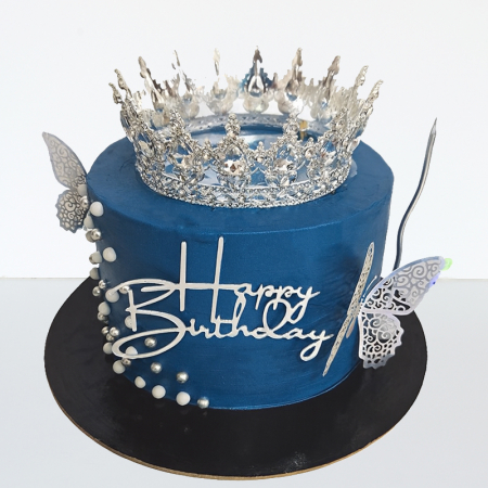 Torturi copii - Tort in frosting in albastru regal, coronita metal, fluturi argintii