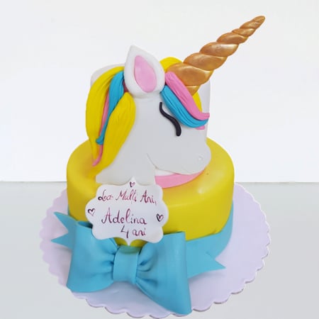 Torturi in pasta de zahar pentru fetite - Tort Unicorn cu fundita albastra