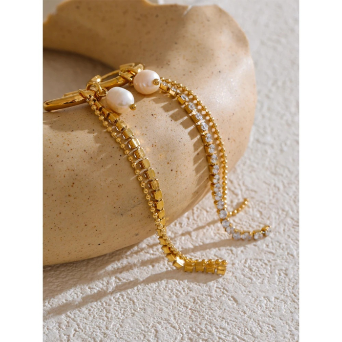 Mara long gold earrings, with pearls and cubic zirconia, made of 18K gold-plated stainless steel [2]