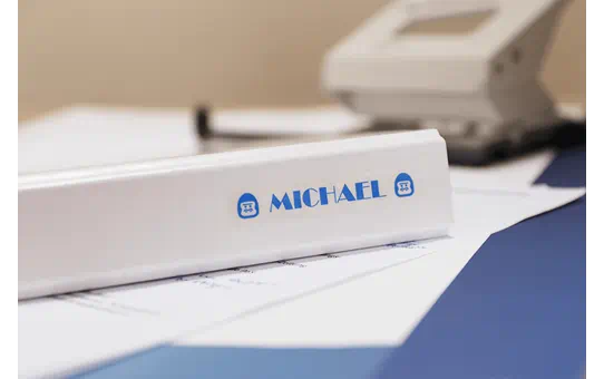 TZE133 12mm BLUE ON CLEAR [4]