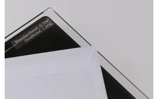 TZE135 12mm WHITE ON CLEAR [4]