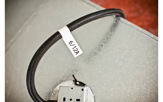 TZEFX231 12mm BLACK  ON WHITE FLEXIBLE ID [4]