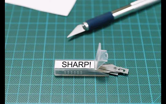 TZES221 9mm BLACK  ON WHITE ADHESIVE TAPE [4]