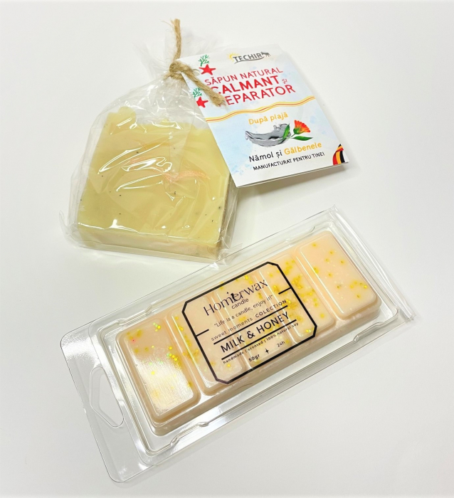 Setul contine: Snap bar cu ceara parfumata de soia, aroma Lapte si miere, clam shell, 50 g; Sapun natural Dupa plaja, Techir, Namol si Galbenele, 120 g.  [3]