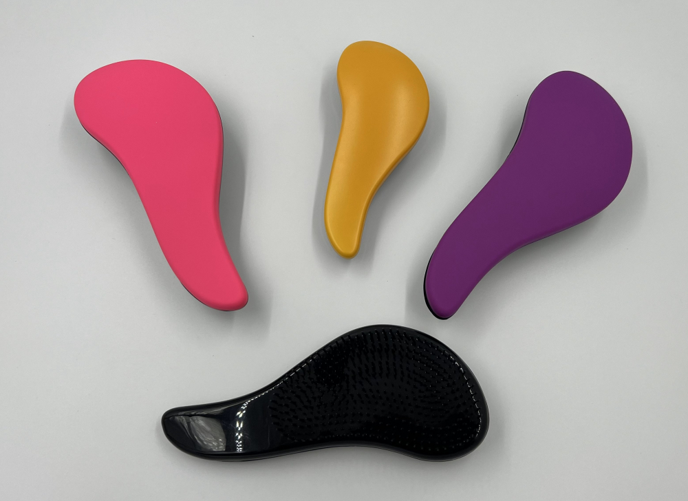 Perie de păr ergonomică  din plastic negru, cu peri de diferite lumgimi, pentru  descurcarea eficeinta a parului si masaj capilar delicat [3]