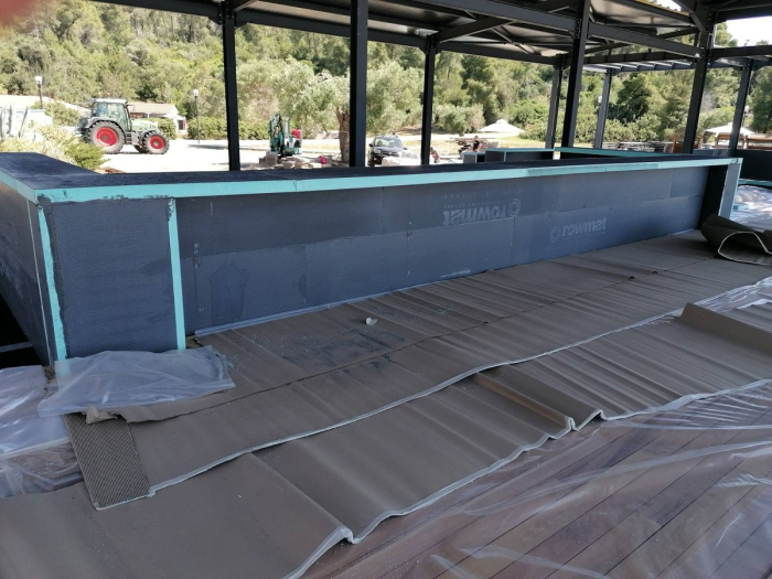 Placi structurale din polistiren extrudat placate cu plasa de fibra de sticla si ciment [34]