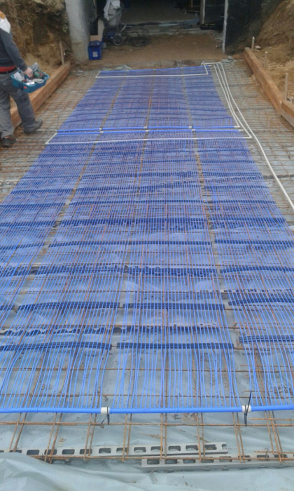 Ground heat exchanger and capillary heating and cooling through floors, walls, ceilings [11]