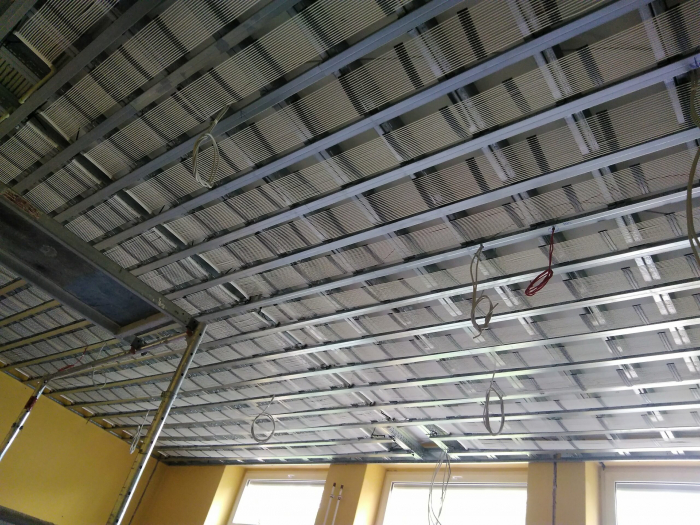 Ground heat exchanger and capillary heating and cooling through floors, walls, ceilings [13]