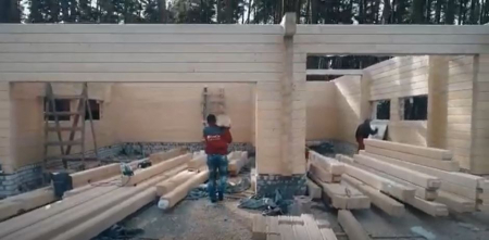 Case din grinzi lamelare prevazute cu nut si feder si sistem de imbinare la capete [27]