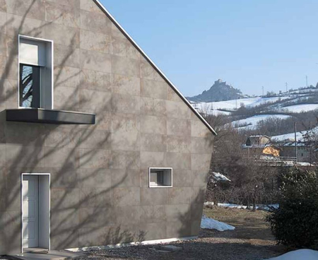 Termosistem exterior din polistren , vata bazaltica sau aerogel cu placare ceramica preinstalata [9]