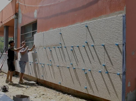 Termosistem exterior din polistren , vata bazaltica sau aerogel cu placare ceramica preinstalata [11]