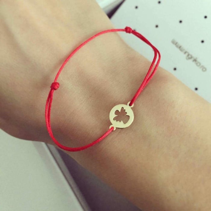 Bratara cu snur reglabil si banut ingeras din aur galben 14K [1]