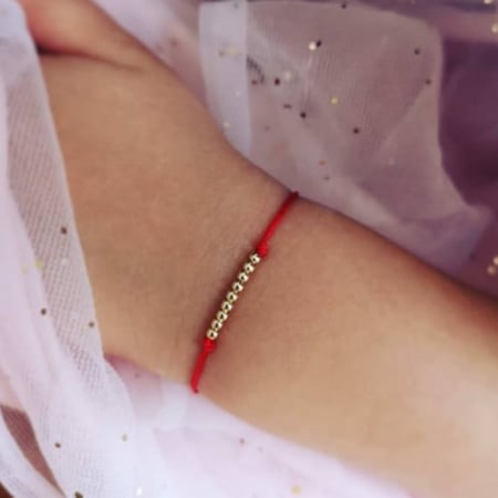 Martisoare Aur - Bratara copii aur 14K cu bilute si snur reglabil