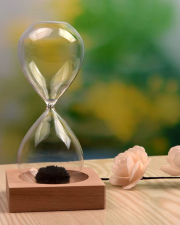 Clepsidră Magnetică cu Nisip Feromagnetic – Efect Vizual Hipnotizant și Bază din Lemn [0]
