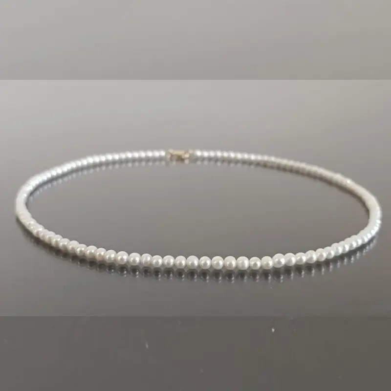 Birthday Gift Ideas for Women - small-natural-pearl-necklace-3-4mm-aaa-rare-14k-gold-kaskadda
