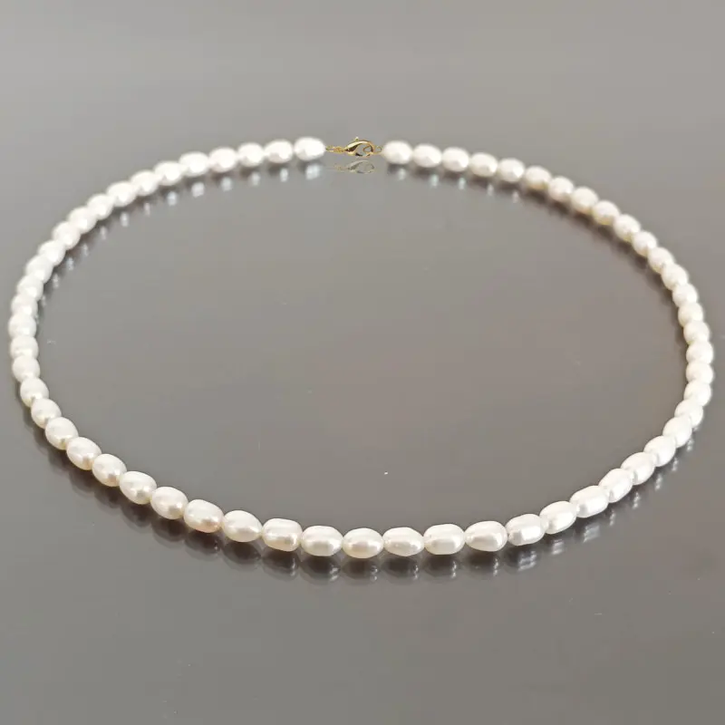 Birthday Gift Ideas for Women - natural-white-oval-pearl-necklace-14k-gold-clasp-kaskadda