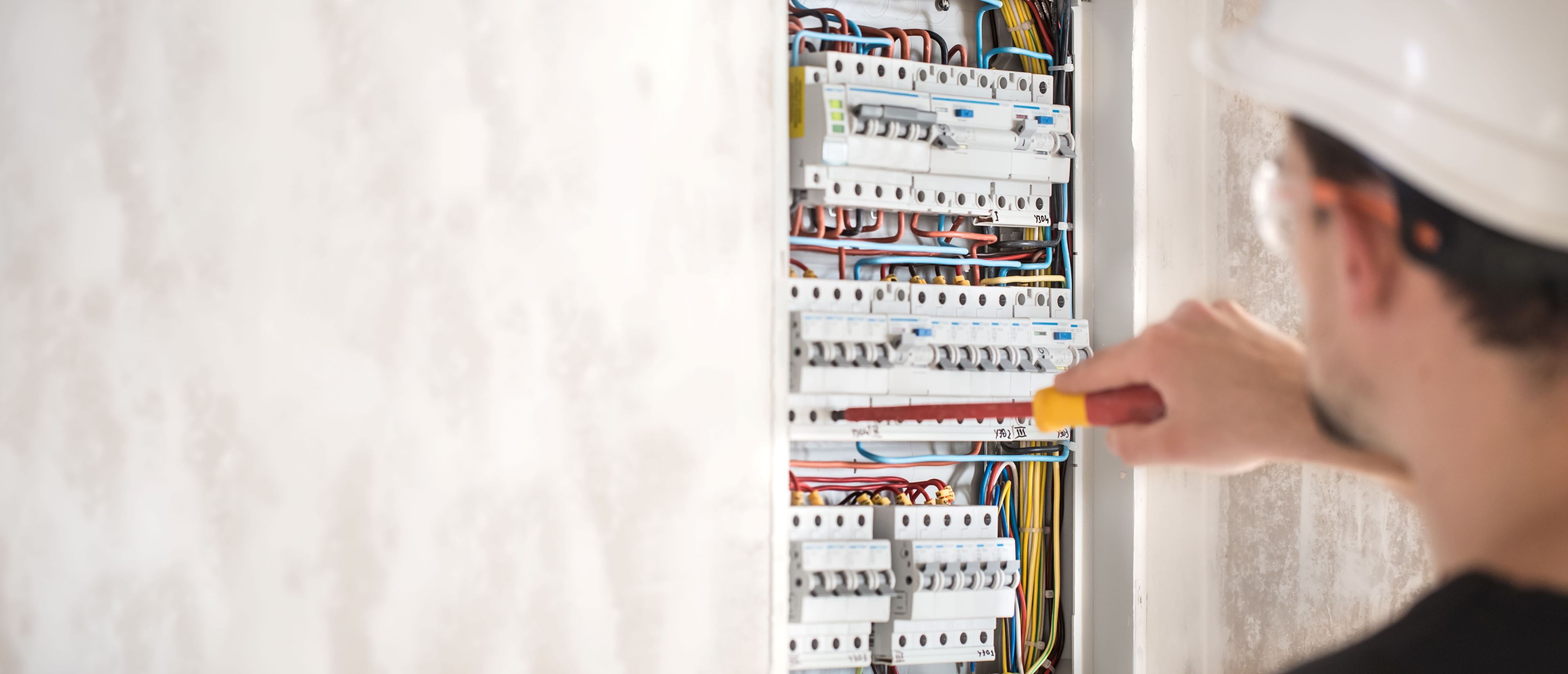 <a href="https://www.freepik.com/free-photo/electrical-technician-working-switchboard-with-fuses_10507549.htm#query=cable&position=7&from_view=search&track=sph">Image by pvproductions</a> on Freepik