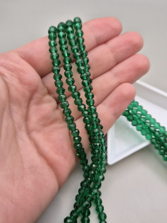 Margele - Margele fatetate 3x4mm verde smarald transp