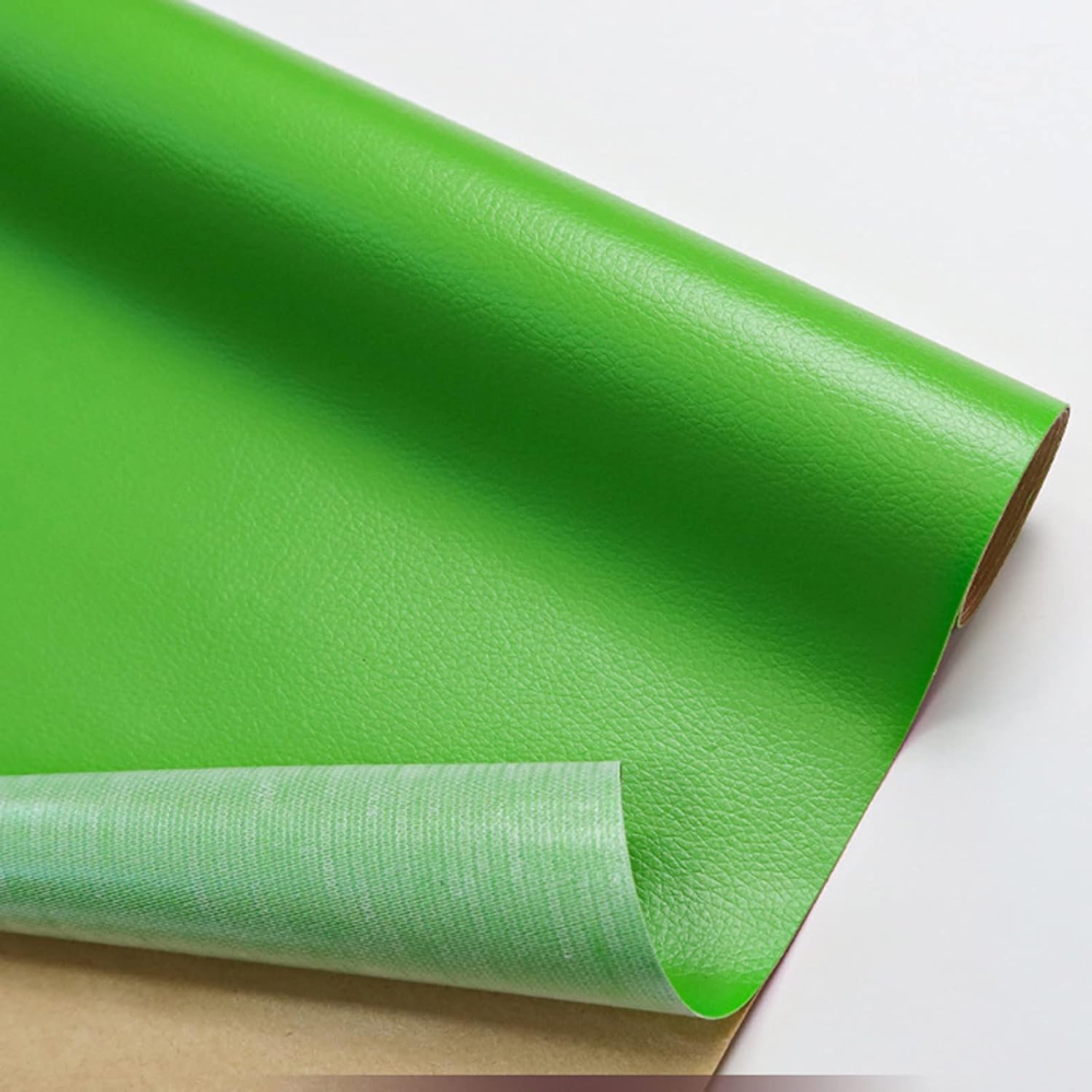 Folie din piele ecologică autoadezivă Luxer, Grass Green, dimensiune 137x60 cm, ideală pentru recondiționare canapea, scaun sau interior auto. [1]