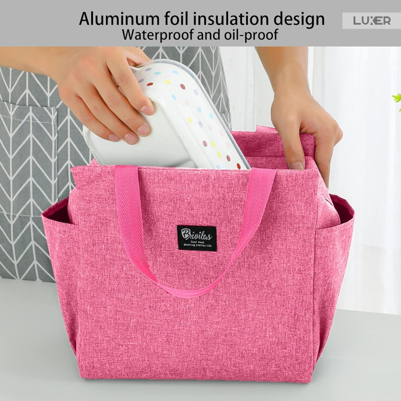 Geantă termoizolantă roz Luxer, rezistentă la apă, pentru păstrarea alimentelor și băuturilor calde 3–4 ore și reci până la 5 ore. [5]