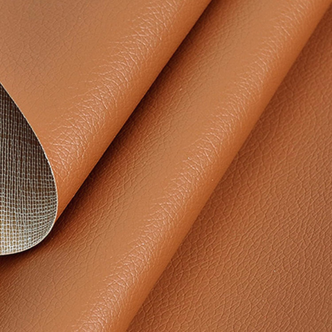Folie din piele ecologică autoadezivă Luxer, Caramel Brown, dimensiune 137x60 cm, ideală pentru recondiționare canapea, scaun sau interior auto. [1]