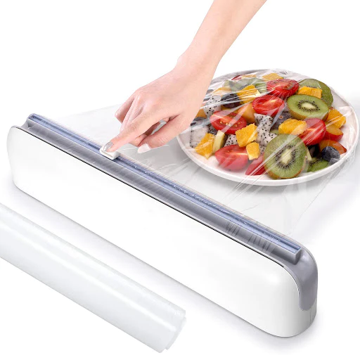 PRET MAXIM 49.99 LEI - Dispenser folie alimentara stretch, cu magnet, lama de taiere si folie inclusa, 38 cm