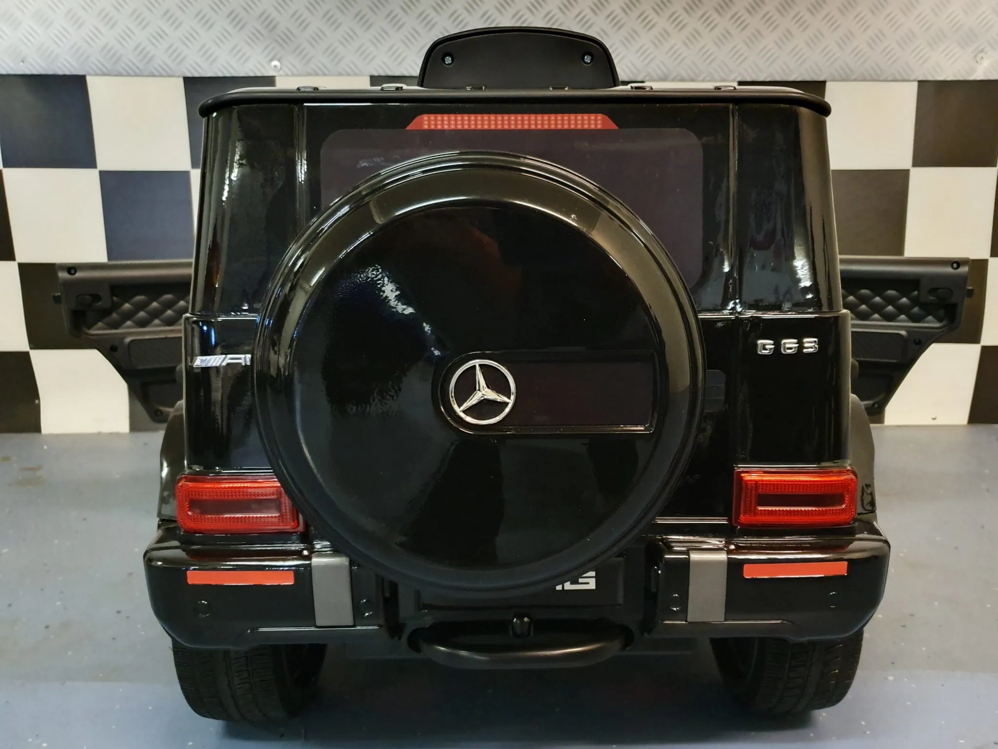 Mașină electrică pentru copii Mercedes-Benz G63 AMG 12V, baterie 7Ah, negru metalizat, 4 motoare, roți cauciuc, scaun piele, telecomandă 2.4G, centură în 5 puncte [6]