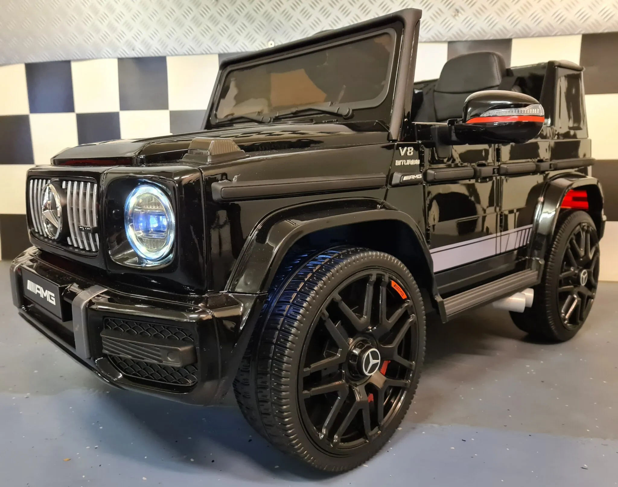 Mașină electrică pentru copii Mercedes-Benz G63 AMG 12V, baterie 7Ah, negru metalizat, 4 motoare, roți cauciuc, scaun piele, telecomandă 2.4G, centură în 5 puncte [2]