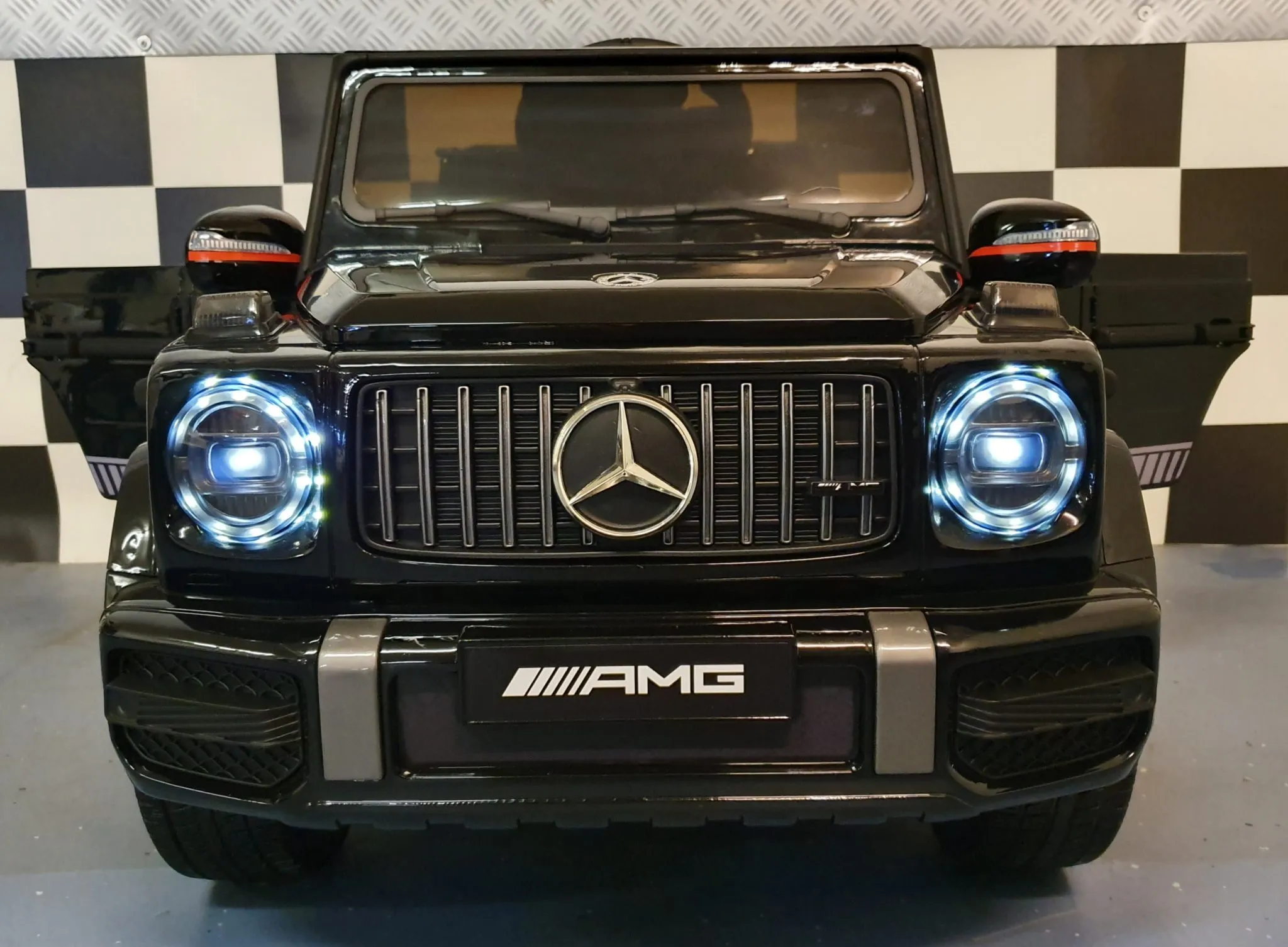 Mașină electrică pentru copii Mercedes-Benz G63 AMG 12V, baterie 7Ah, negru metalizat, 4 motoare, roți cauciuc, scaun piele, telecomandă 2.4G, centură în 5 puncte [3]