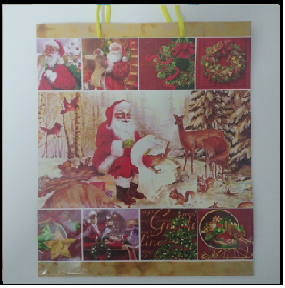 Pungi pentru cadouri - Pungă pentru  cadouri model Crăciun mici 18x10x23 cm , din hârtie plastifiată