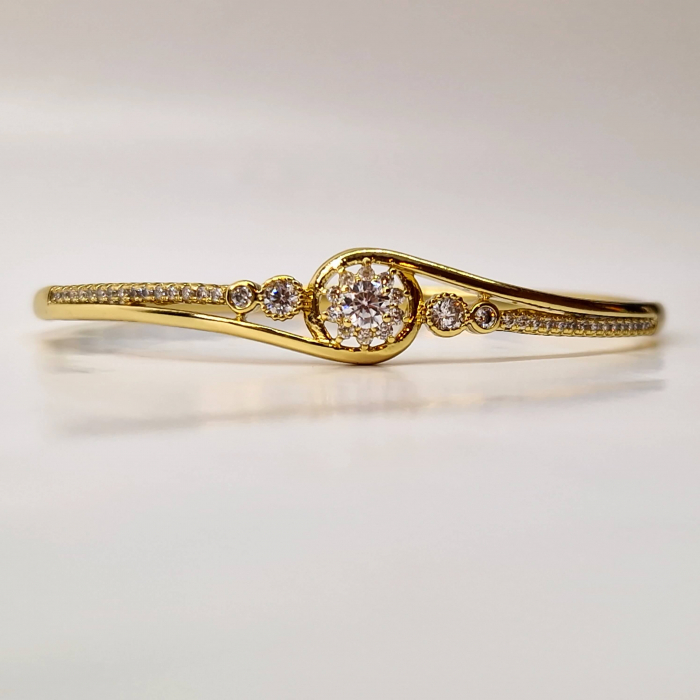 Bratara dama placata cu aur de 14k cu cristal central in forma de floare din zirconiu transparent [1]