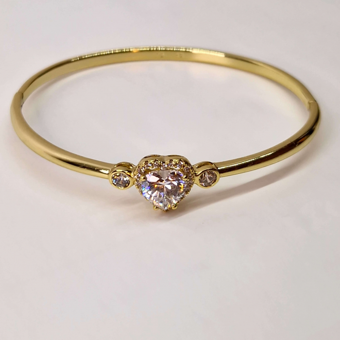 Bratara dama placata cu aur galben de 14K impodobita cu un cristal central in forma de inima din zirconiu transparent [4]