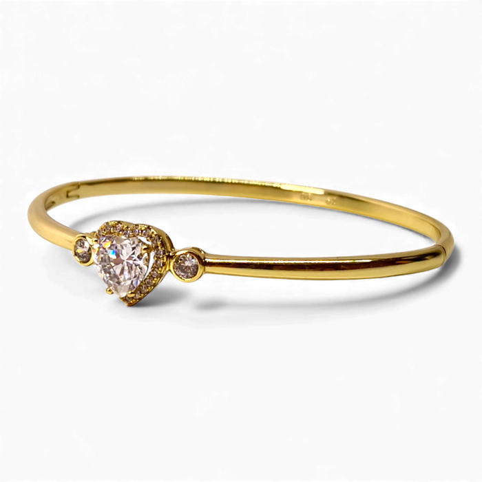 Bratara dama placata cu aur galben de 14K impodobita cu un cristal central in forma de inima din zirconiu transparent [3]