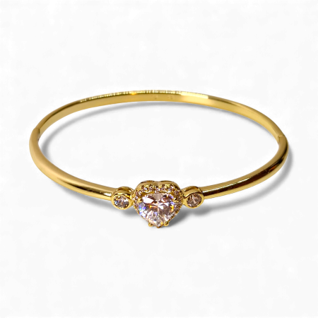 Bratara dama placata cu aur galben de 14K impodobita cu un cristal central in forma de inima din zirconiu transparent [6]