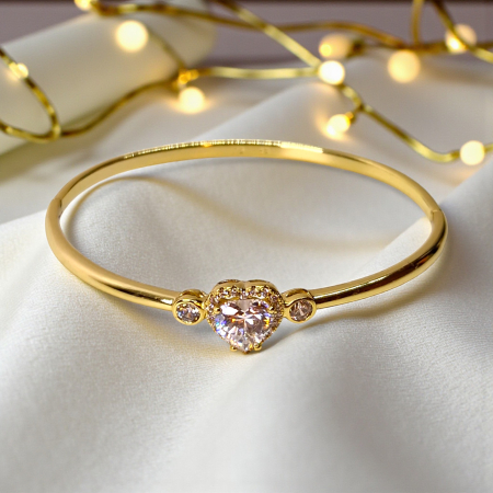 Bratara dama placata cu aur galben de 14K impodobita cu un cristal central in forma de inima din zirconiu transparent [5]