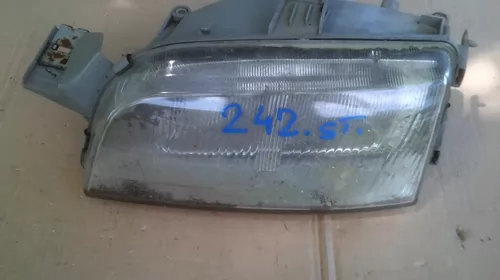 Faruri si stopuri - Far Stanga pentru Fiat Punto 1, cod 142597-00