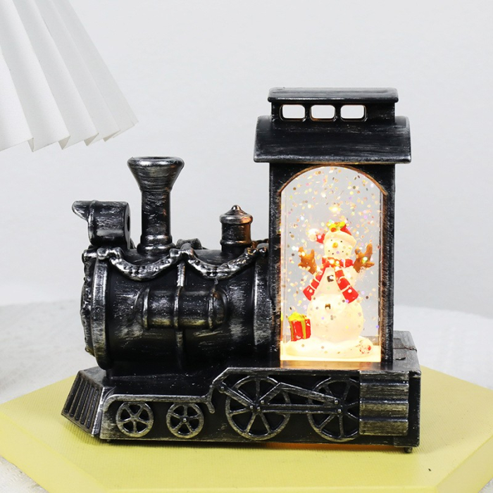 Decoratiune de Craciun tip Locomotiva, Flippy, Glob de Cristal cu Fulgi de Zapada, Model Om de Zapada, Iluminare LED, 11.5 x 12.5 x 6 cm, Carcasa Vintage Bronze, Transparent [1]