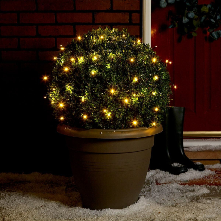 Liniar 220V - Instalatie de Craciun liniara Yoto, 10 m, din care 1 m cablu priza 220V, 100 LED, 8 jocuri de lumini, controler, fir negru, alb cald