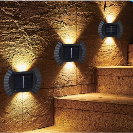 Lampi solare - Set 4 Aplice solare LED Bidirectionale pentru perete Flippy, in forma de funda, 8 LED-uri, material ABS si PC, lumina puternica, IP65, 10 x 7.5 cm, baterie 1.2 V, 300 mAh, autonomie 8-10 ore, alb cald