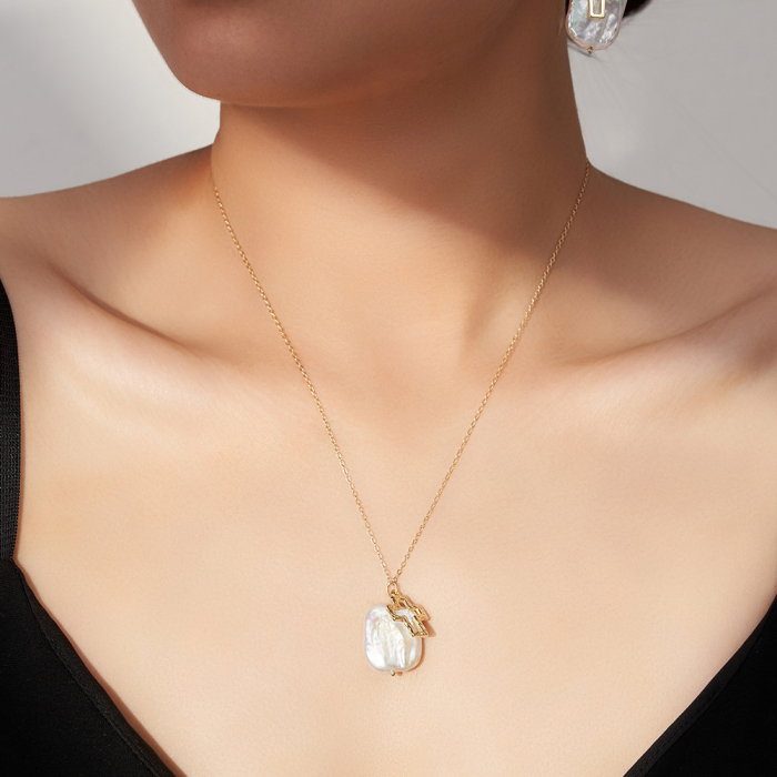 Colier din argint aurit cu perla baroc și cruce – eleganță și simbolism [3]