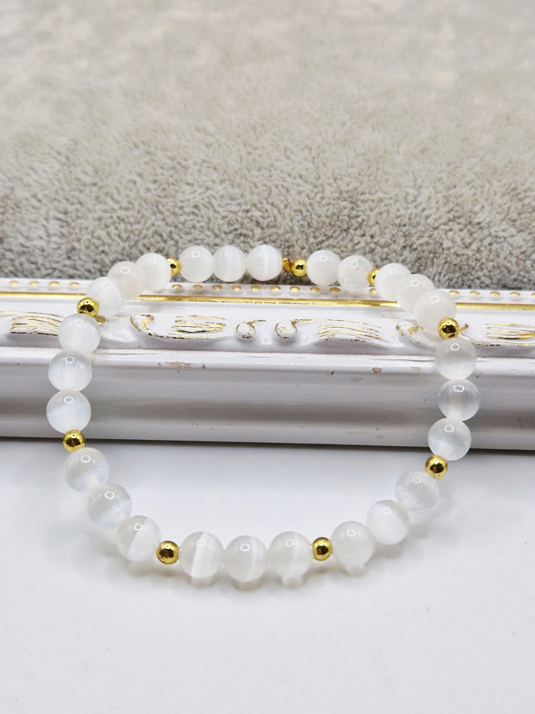 Bratara elastica din ochi de pisica alb cu distantiere din hematit auriu. [2]