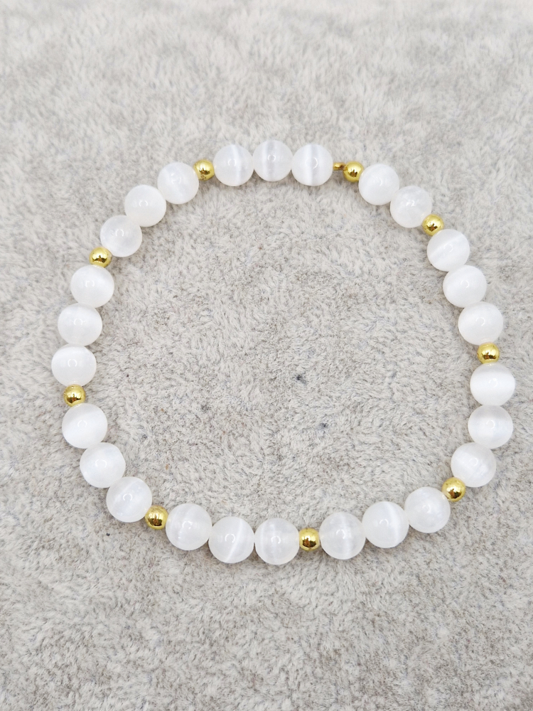 Bratara elastica din ochi de pisica alb cu distantiere din hematit auriu. [3]