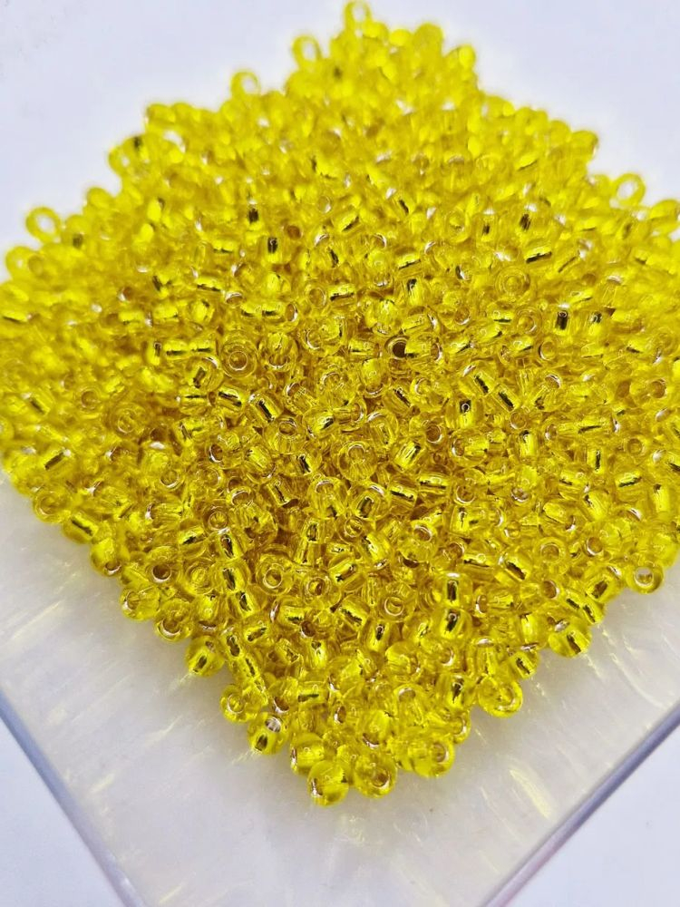 Toho 3mm, Silver Lined Lemon - 10g [1]