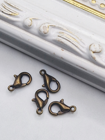 ACCESORII - Inchizatoare din bronz 10x5mm Se vinde la bucata. orificiu 1.5mm