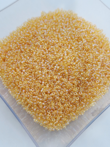 Miyuki 15/0 - Miyuki 1.5mm Transparent Lt Topaz AB 0251- 5g Orificiu 0.7mm Aprox. 1347 bucăți