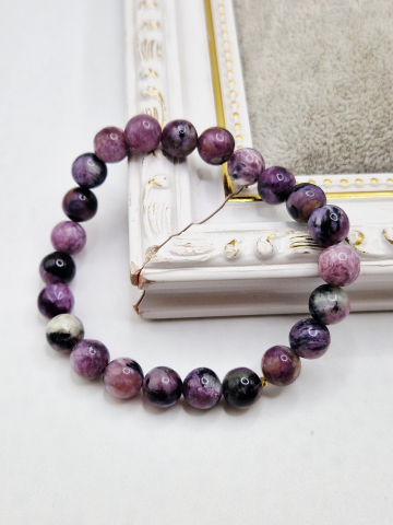 BIJUTERII HANDMADE - Bratara elastica din rodonit mov. Lungime 18cm. Sfera 7.5mm.