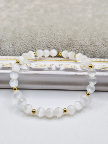 Bratara elastica din ochi de pisica alb cu distantiere din hematit auriu. [1]