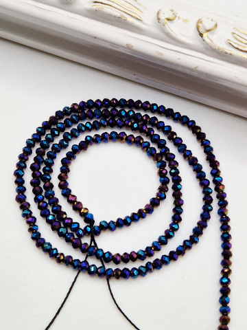 Cristale rondele 2mm - Cristale 2mm albastru-mov - șirag scurt 18cm Cristale de 2mm albastru-mov.