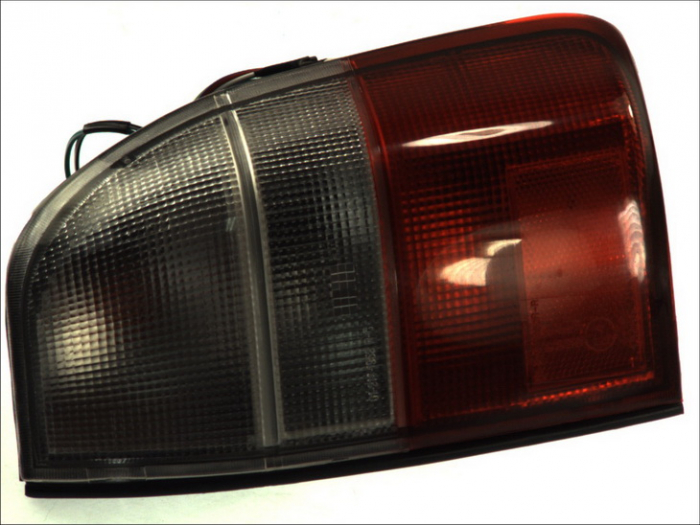 Stop tripla lampa spate dreapta (Semnalizator fumuriu, culoare sticla fumuriu) MITSUBISHI L 200 PICK-UP 1996-2001