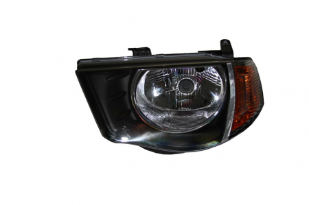 Far stanga (H4, electric, fundal negru) MITSUBISHI L 200 2005-2010